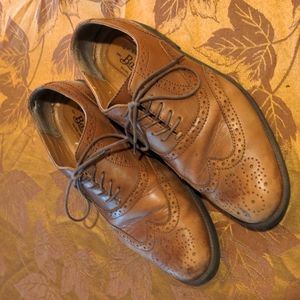 Brown wingtip shoes